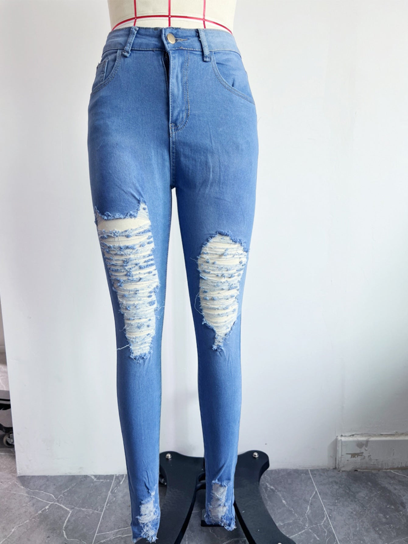 Ripped Denim Skinny Jeans