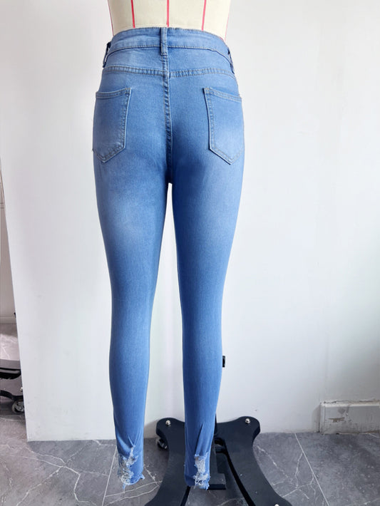 Ripped Denim Skinny Jeans